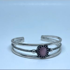 Bangle bracelet with pink stone